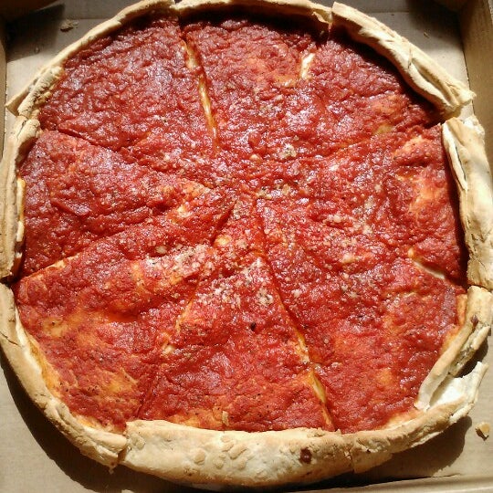 Photo taken at Sicilia&#39;s Pizzeria by Melissa M. on 6/24/2012