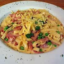 Try the Fettuccini Carbonara- With ham and peas in a Parmesan cheese cream sauce