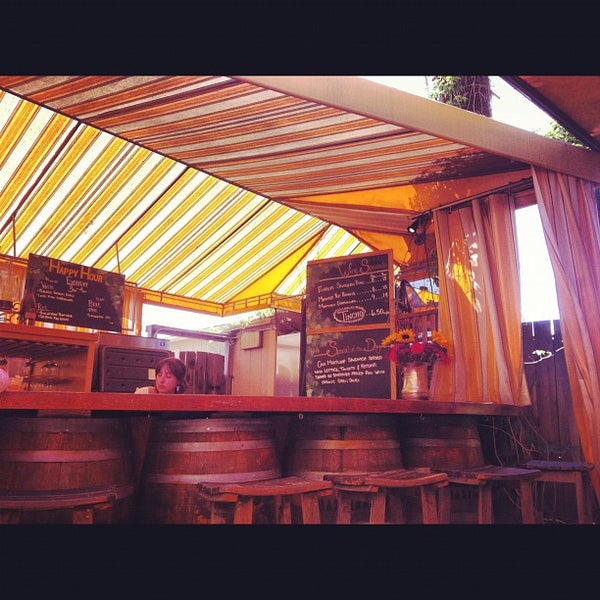 Photo taken at Sunflower Caffé Espresso &amp; Wine by justine . on 5/12/2012