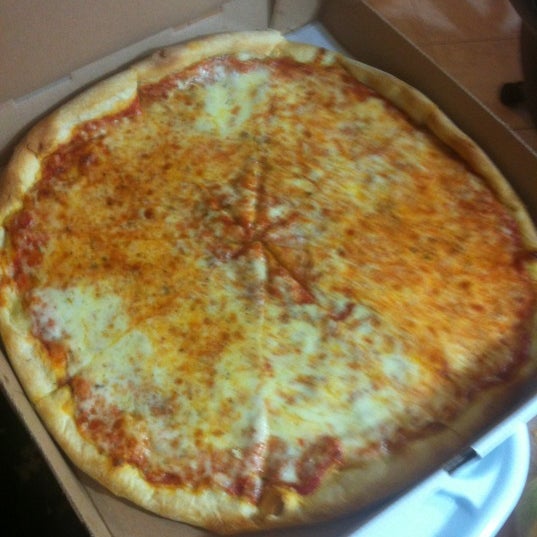 Photo taken at Ella New York Pizza &amp; Pasta by allen s. on 7/19/2012