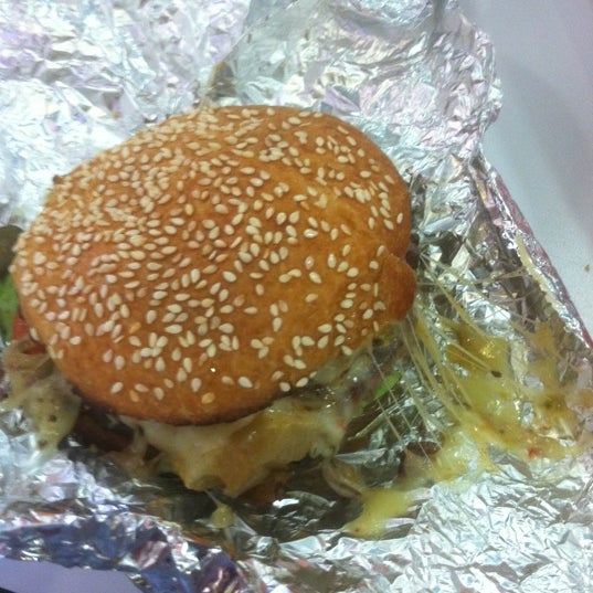 Photo taken at MOOYAH Burgers, Fries &amp; Shakes by Robert L. on 8/7/2012
