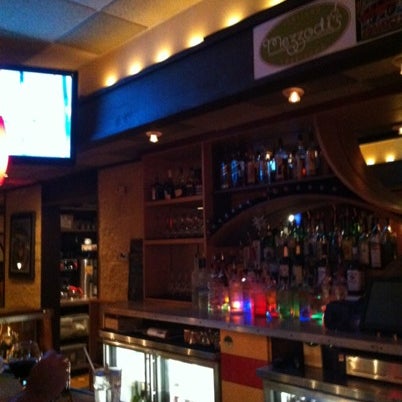 Photo taken at Mezzodi&#39;s Restaurant by Charly S. on 8/3/2012