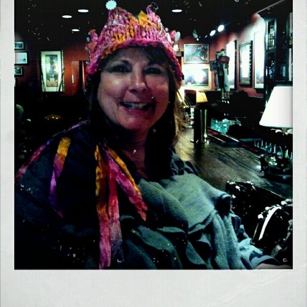 Photo taken at Jinja Bar &amp; Bistro by Kathy D. on 12/31/2011