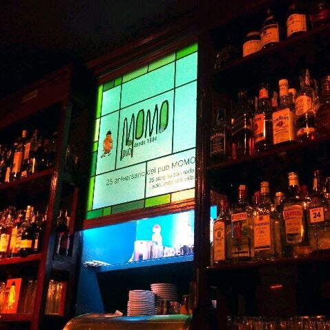 Photo taken at Momo Pub by Miguel S. on 6/1/2012