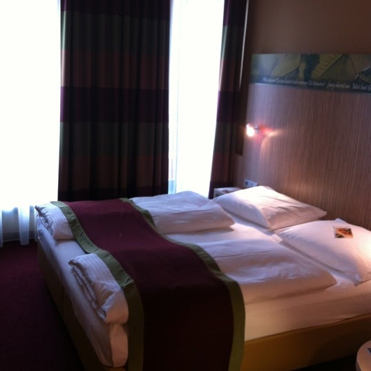 Photo taken at Mövenpick Hotel Frankfurt City by Eveline3112 on 3/9/2012