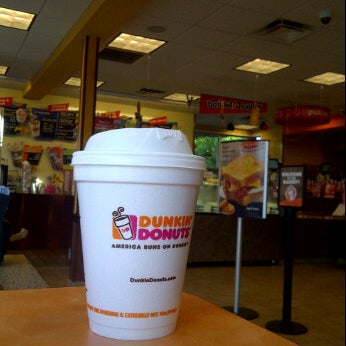 Photo taken at Dunkin&#39; by J M. on 10/12/2011