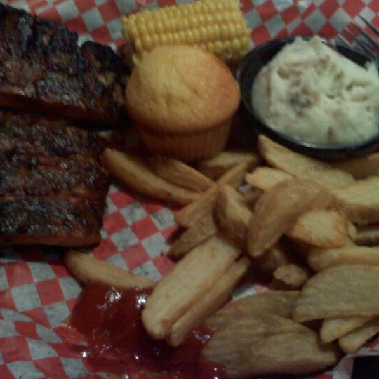 Photo taken at Famous Dave&#39;s by Beverly H. on 2/12/2012