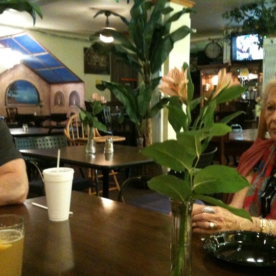Photo taken at The Hideaway Cafe by Steve G. on 7/31/2011