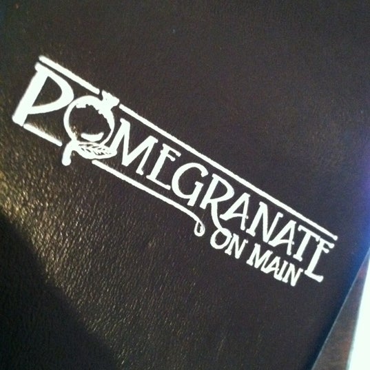 Photo taken at Pomegranate on Main by Lauren Brooke on 7/7/2012