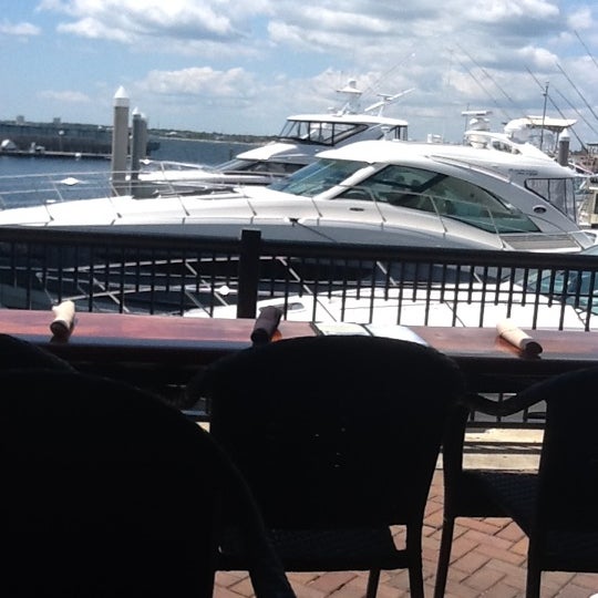 Photo taken at Jaco&#39;s Bayfront Bar &amp; Grille by Lillie S. on 4/20/2012