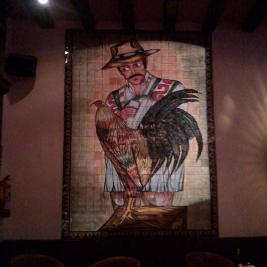 Photo taken at Restaurant &amp; Lounge Los Azulejos by Barry L. on 1/1/2012