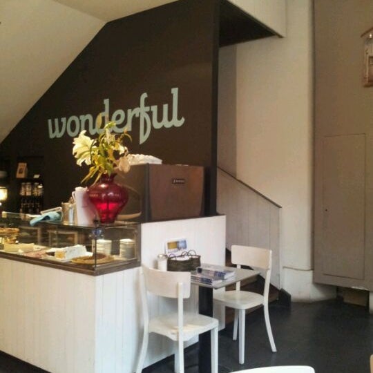 Photo taken at Wonderful Café by Marcela B. on 4/13/2012
