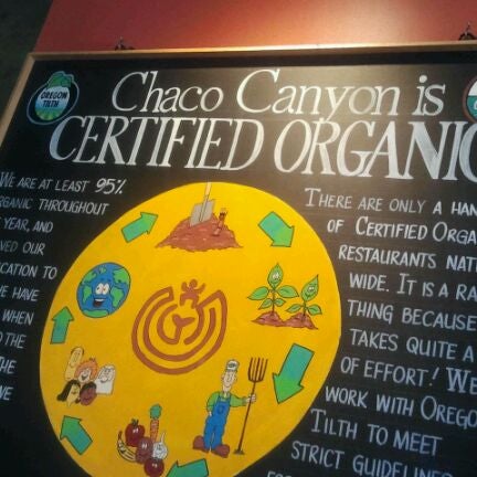 Photo taken at Chaco Canyon Organic Cafe by Terri L. on 4/12/2012