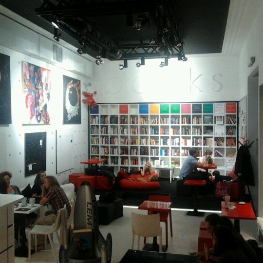 Photo taken at MiTo art café books by Wojtek J. on 7/17/2012