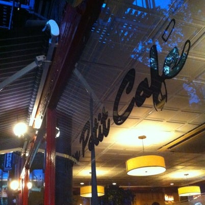 Photo taken at Mon Petit Café by Qian S. on 8/1/2012