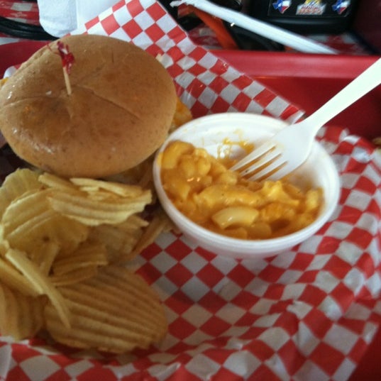 Photo taken at Dick&#39;s Bodacious BBQ by Eric P. on 7/4/2012