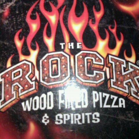 Photo taken at The Rock Wood Fired Pizza by Jason E. on 5/4/2012
