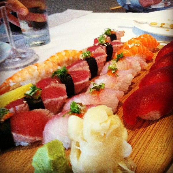 Photo taken at Sushi Sasa by Kelly W. on 6/20/2012