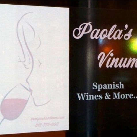 Photo taken at Paola&#39;s Vinum by Rocio C. on 1/29/2012