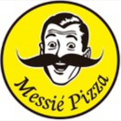 Photo taken at Messié Pizza by Eric L. on 1/21/2012