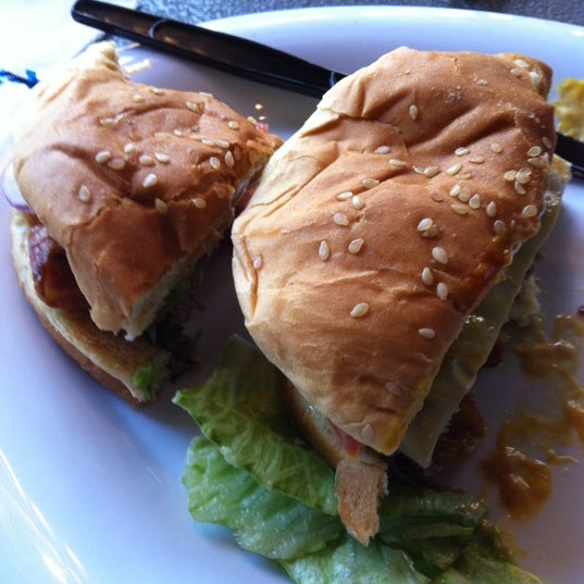 Photo taken at CG Burgers-Merrick by Tu M. on 4/9/2012
