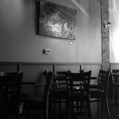 Photo taken at Black Cat Coffee House by Jeff D. on 1/13/2012