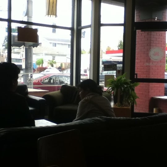 Photo taken at Seven Virtues Coffee Roasters by X on 5/2/2012