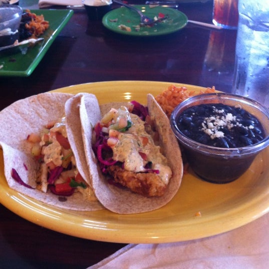 Photo taken at Nacho Mama&#39;s Mexican Grill by Lourdes L. on 3/10/2012