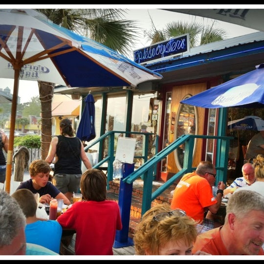 Photo taken at Dirty Don&#39;s Oyster Bar &amp; Grill by Mike B. on 7/21/2011