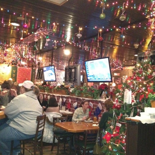Photo taken at Village Tavern &amp; Grill by Darrell N. on 12/29/2011
