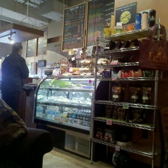 Photo taken at Firefly Coffee House by Scott H. on 12/13/2011