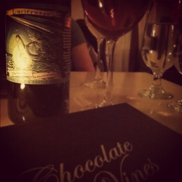 Photo taken at Chocolate and Vines by Amy E. on 2/17/2012
