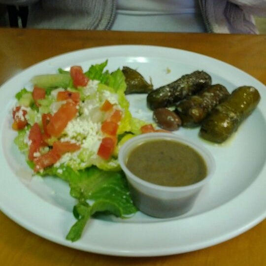 Photo taken at Oliveo Grill by Chris K. on 1/21/2012