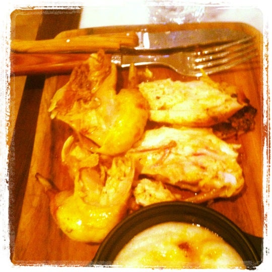 Sit downstairs at the kitchen counter, make sure you order the rotisserie chicken with polenta, heaven!!