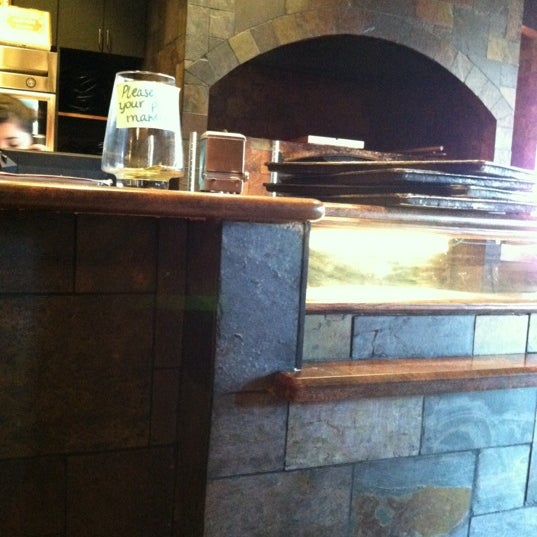 Photo taken at Russo&#39;s New York Pizzeria by MarioCesar S. on 5/31/2012