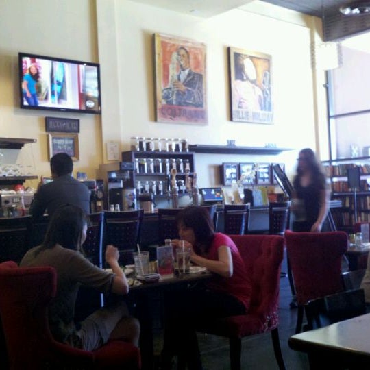 Photo taken at The Novel Cafe by Nicole R. on 8/4/2011