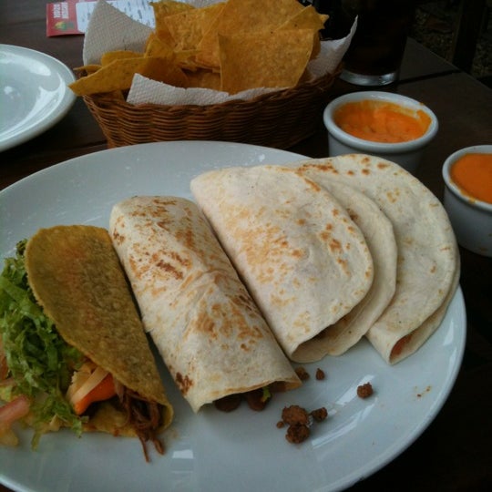 Photo taken at Taco &amp; Chilli by Andrew P. on 7/15/2012