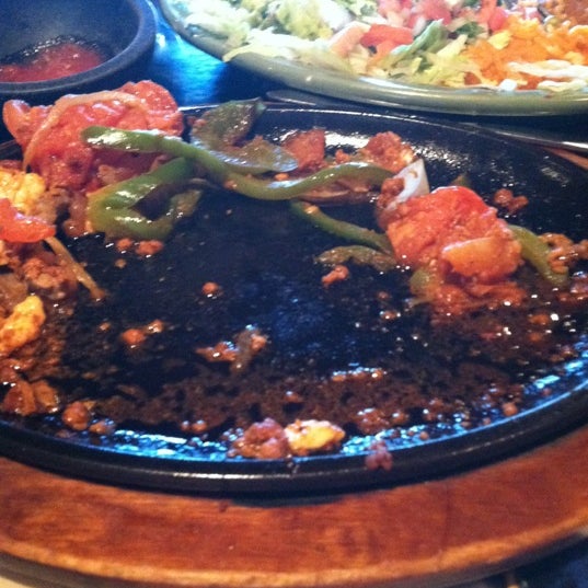Photo taken at Los Agaves Mexican Grill by Mandy D. on 8/21/2012