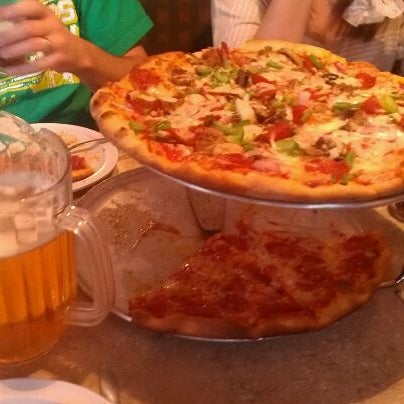 Photo taken at Sal&#39;s Gilbert Pizza by Doug F. on 3/18/2012
