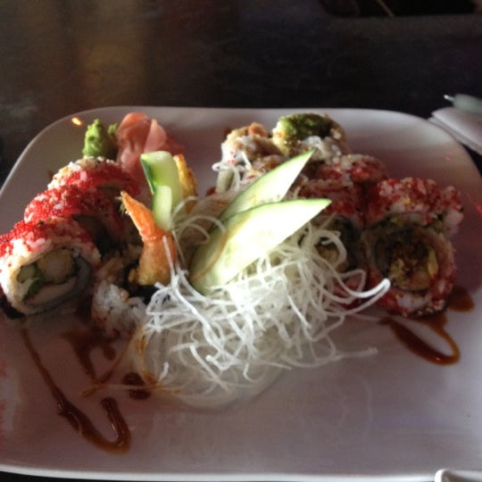 Photo taken at Sushi Blues Cafe by Steph C. on 6/13/2012