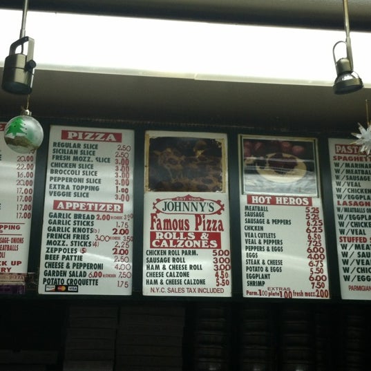 Photo taken at Johnny&#39;s Pizzeria by George V. on 1/2/2012