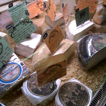 Photo taken at Marion Street Cheese Market by Katie W. on 12/21/2011