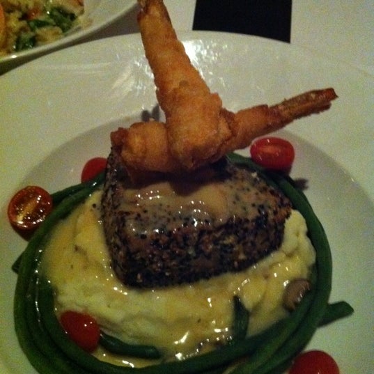 Photo taken at Mistral Restaurant and Bar by Megan M. on 2/17/2012