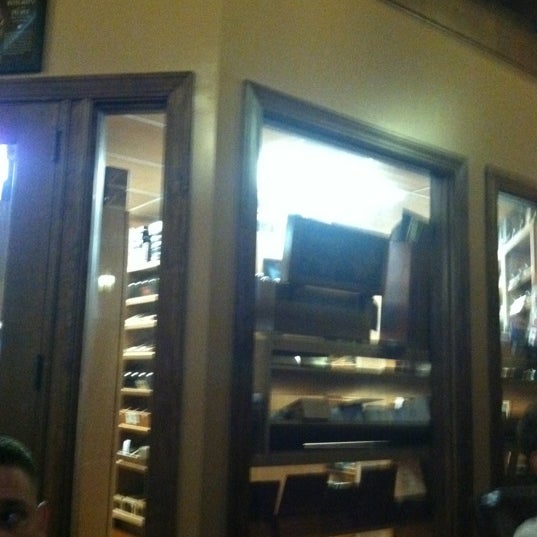 Photo taken at The Smokey Cigar by Freddy A. on 6/1/2012