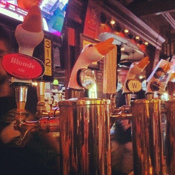 Photo taken at Goose Island Brewpub by Grant M. on 8/11/2012