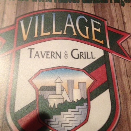 Photo taken at Village Tavern &amp; Grill by Michael on 7/8/2012