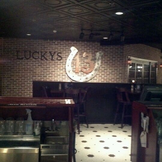 Photo taken at Lucky&#39;s 13 Pub by Matt H. on 4/4/2012