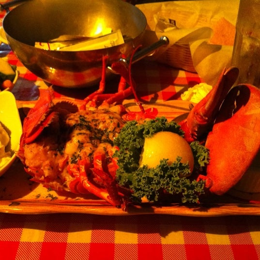 Photo taken at Lobster Pot Restaurant by Rosalie S. on 7/6/2012