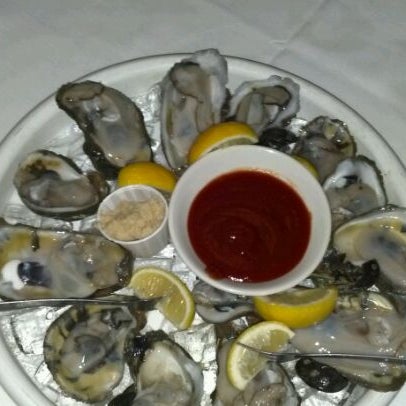 Photo taken at Christie&#39;s Seafood &amp; Steaks by Michael H. on 1/12/2012