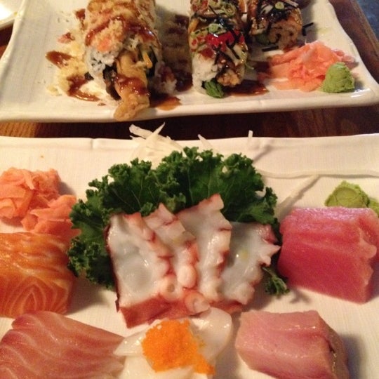 Photo taken at Sushi Park by Carrie C. on 6/29/2012